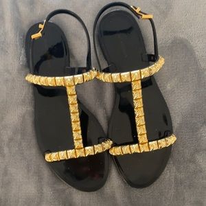 Black and Gold Stuart Weitzman studded sandals